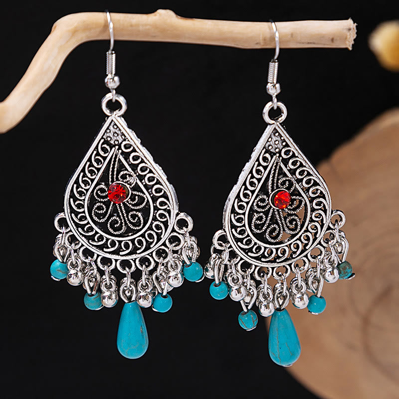 Boucles d'oreilles Olivenorma style ethnique rétro bohème à pampilles turquoise