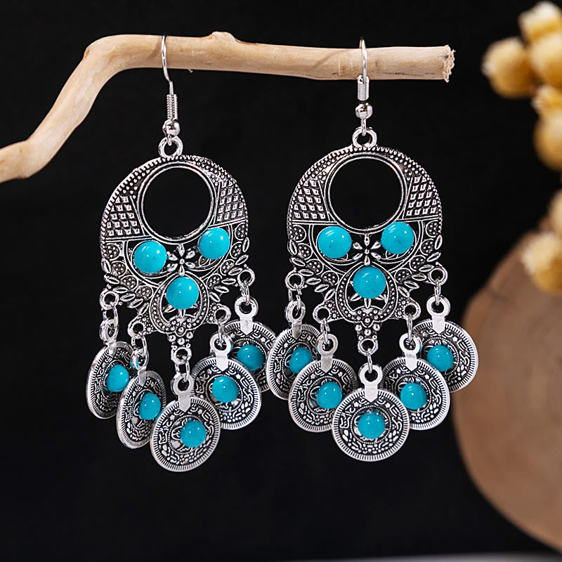 Boucles d'oreilles Olivenorma style ethnique rétro bohème à pampilles turquoise