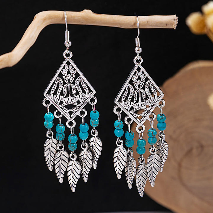 Boucles d'oreilles Olivenorma style ethnique rétro bohème à pampilles turquoise