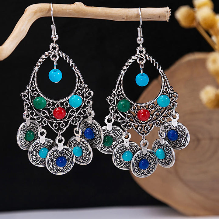 Boucles d'oreilles Olivenorma style ethnique rétro bohème à pampilles turquoise