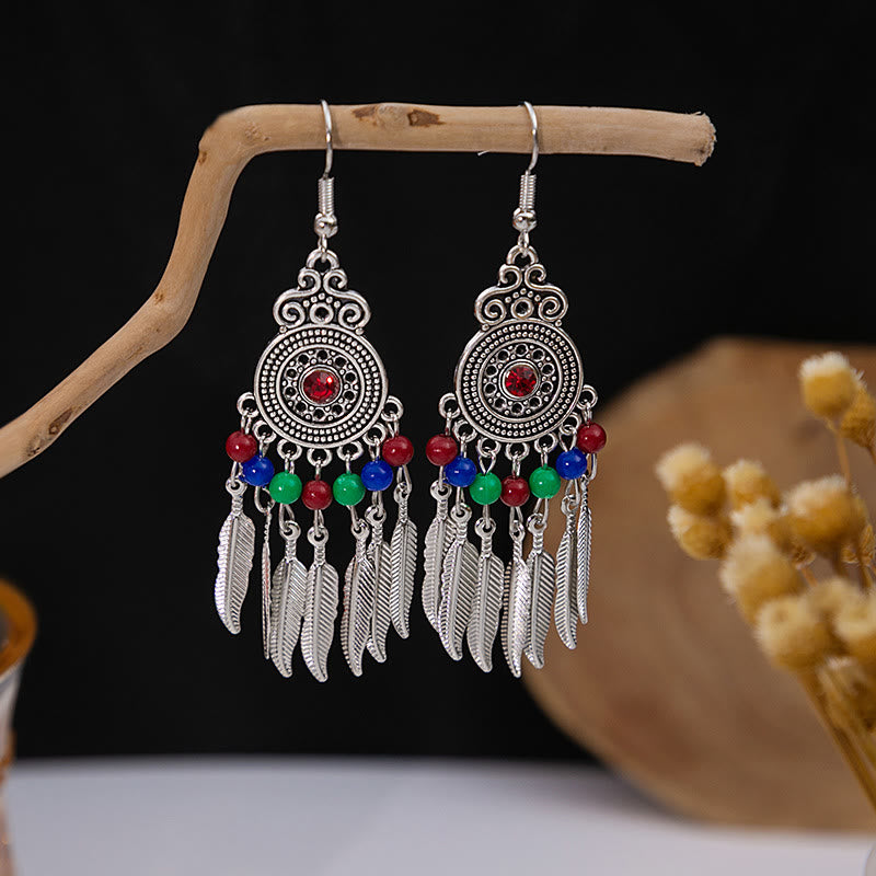 Boucles d'oreilles Olivenorma style ethnique rétro bohème à pampilles turquoise