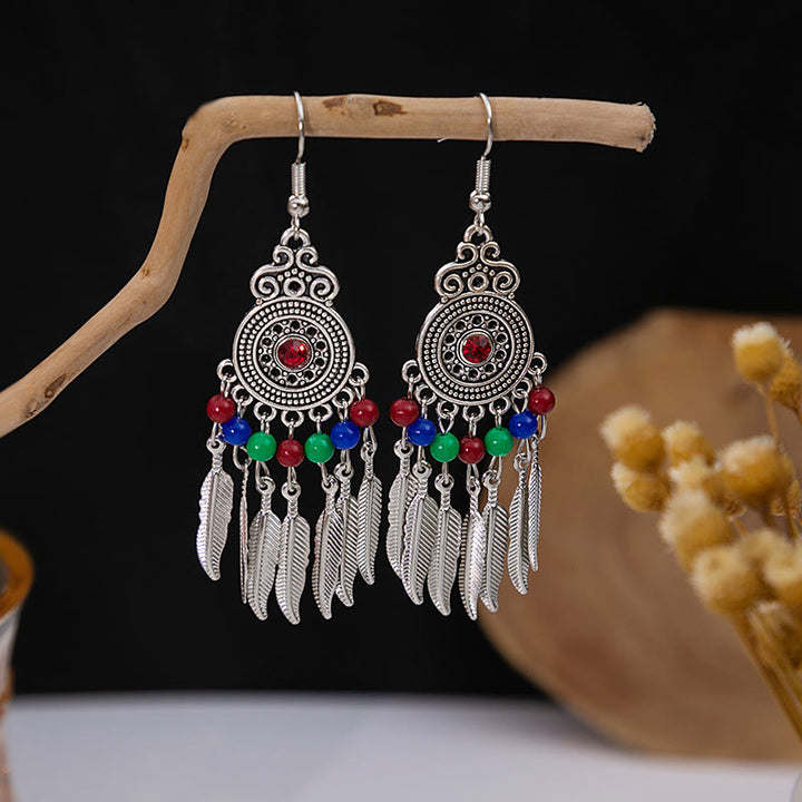 Boucles d'oreilles Olivenorma style ethnique rétro bohème à pampilles turquoise
