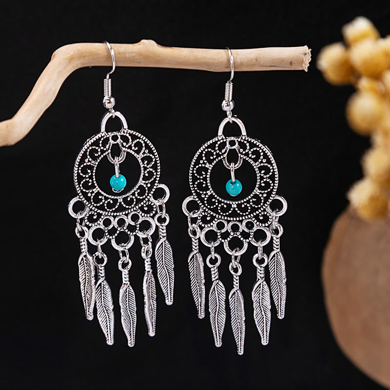 Boucles d'oreilles Olivenorma style ethnique rétro bohème à pampilles turquoise