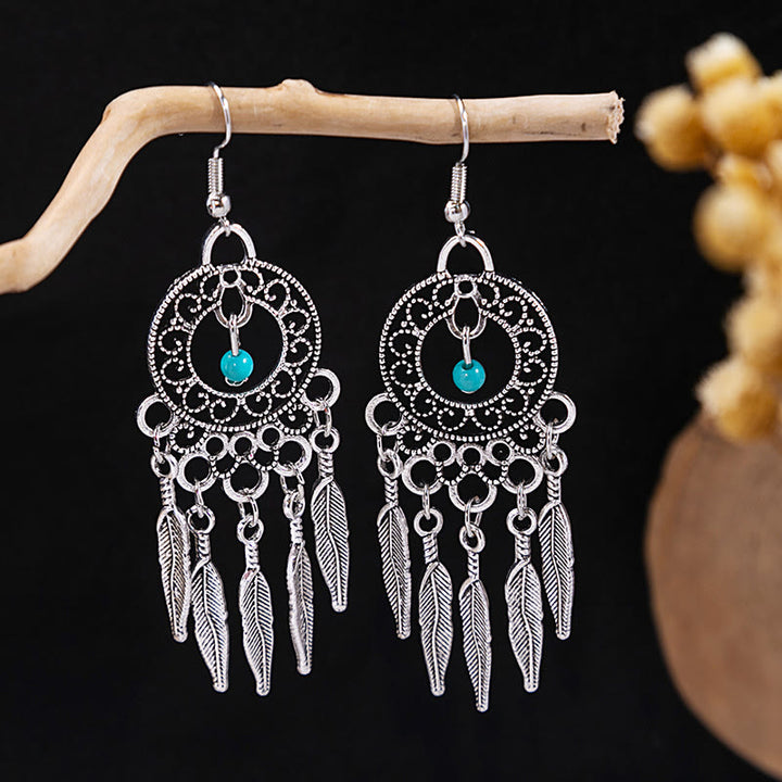 Boucles d'oreilles Olivenorma style ethnique rétro bohème à pampilles turquoise