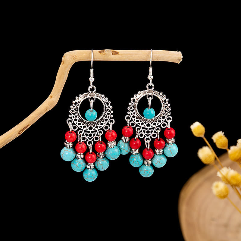 Boucles d'oreilles Olivenorma style ethnique rétro bohème à pampilles turquoise