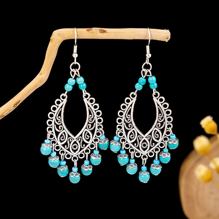 Boucles d'oreilles Olivenorma style ethnique rétro bohème à pampilles turquoise