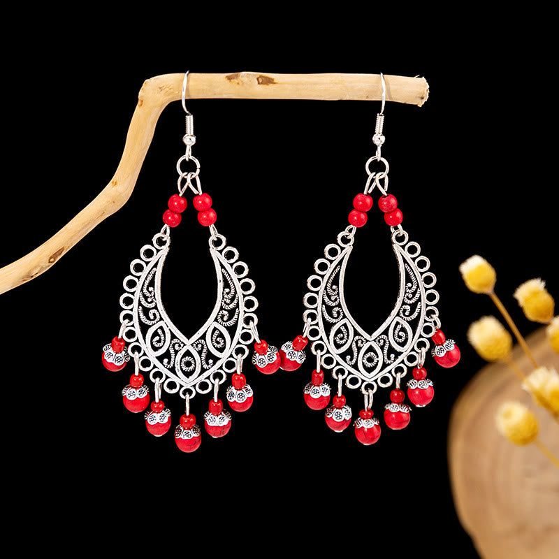 Boucles d'oreilles Olivenorma style ethnique rétro bohème à pampilles turquoise