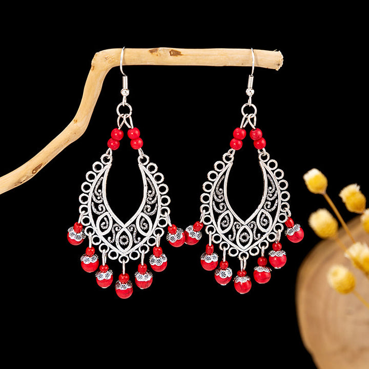 Boucles d'oreilles Olivenorma style ethnique rétro bohème à pampilles turquoise