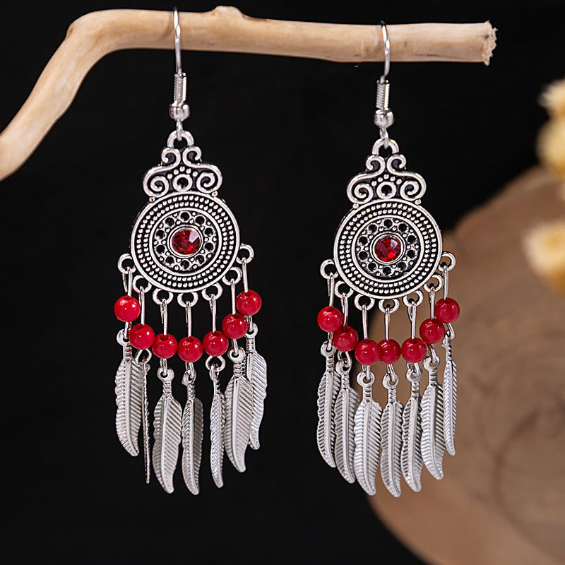 Boucles d'oreilles Olivenorma style ethnique rétro bohème à pampilles turquoise