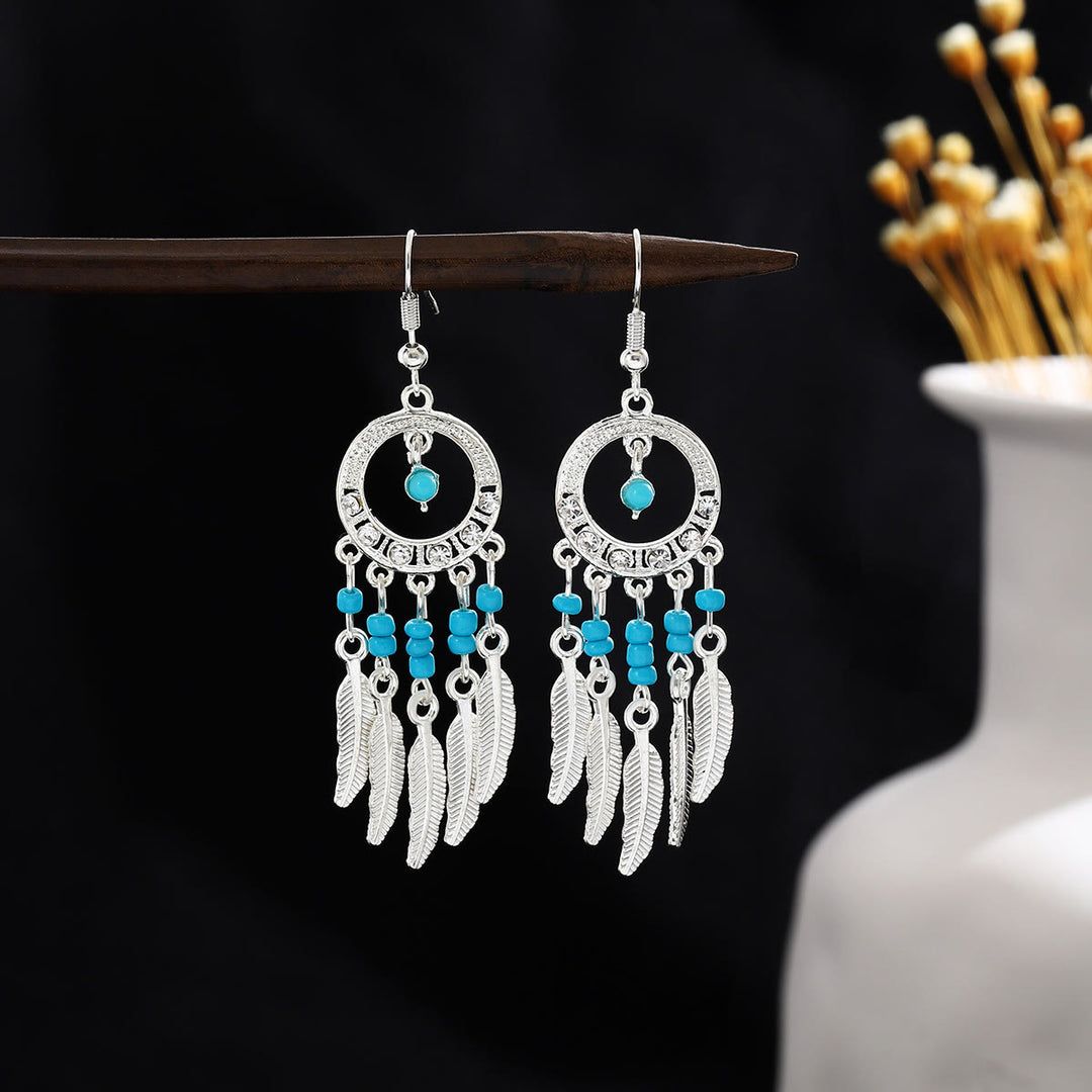Boucles d'oreilles Olivenorma style ethnique rétro bohème à pampilles turquoise