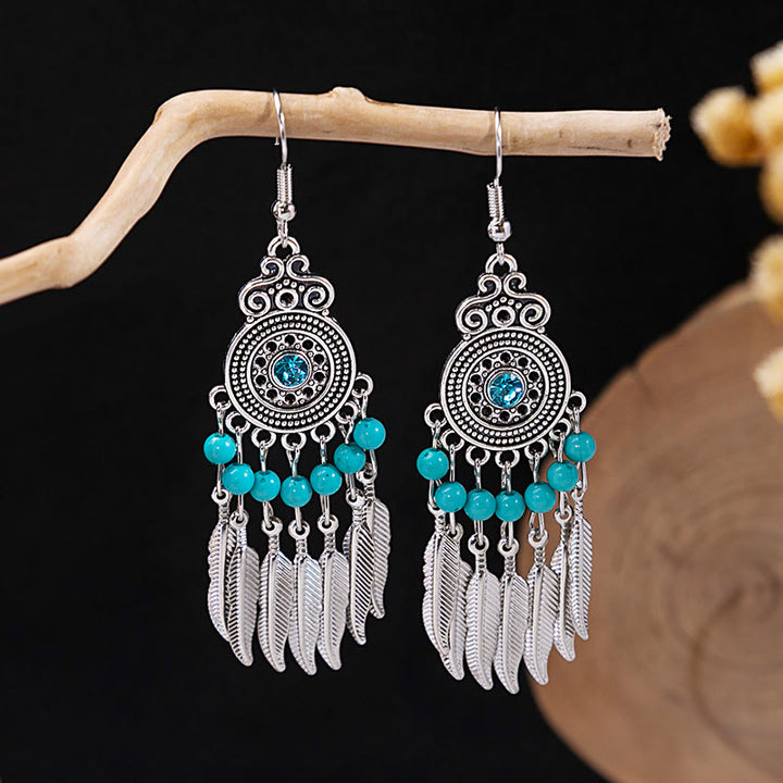 Boucles d'oreilles Olivenorma style ethnique rétro bohème à pampilles turquoise