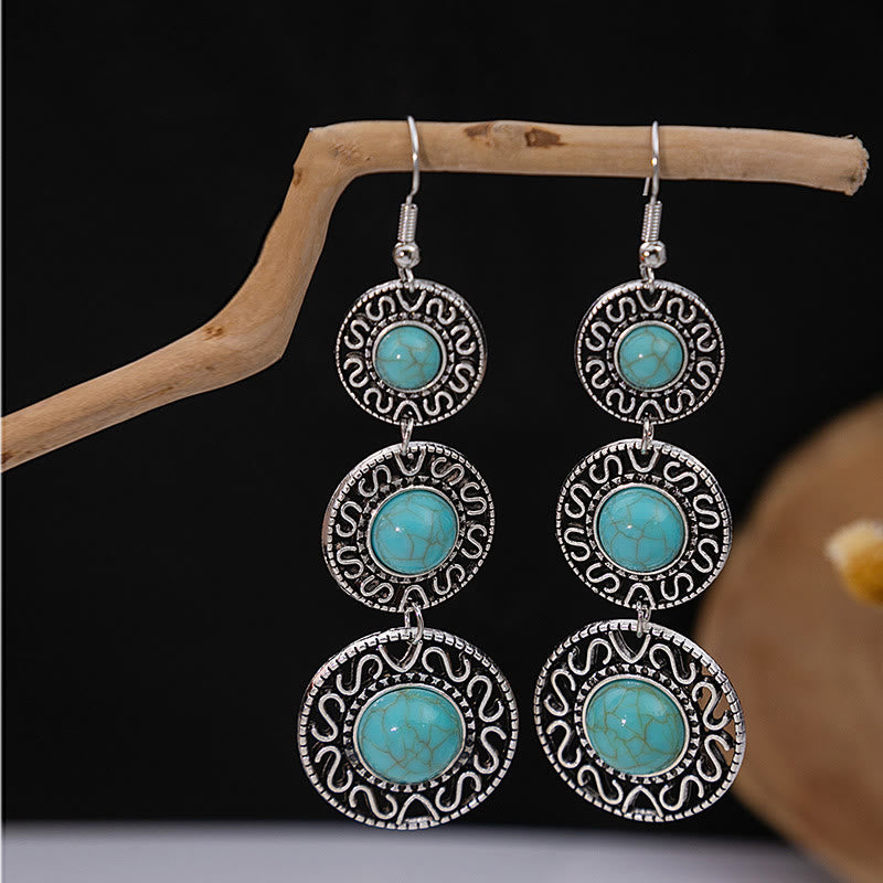 Boucles d'oreilles Olivenorma style ethnique rétro bohème à pampilles turquoise