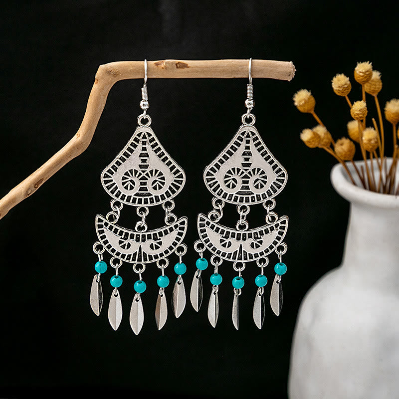 Boucles d'oreilles Olivenorma style ethnique rétro bohème à pampilles turquoise