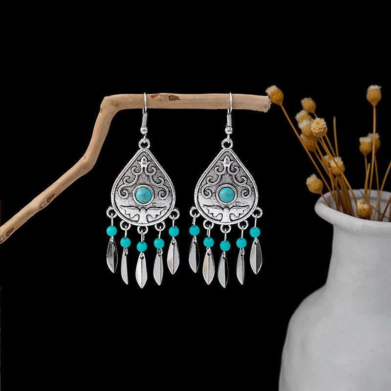 Boucles d'oreilles Olivenorma style ethnique rétro bohème à pampilles turquoise