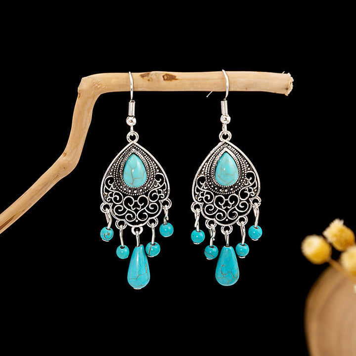 Boucles d'oreilles Olivenorma style ethnique rétro bohème à pampilles turquoise