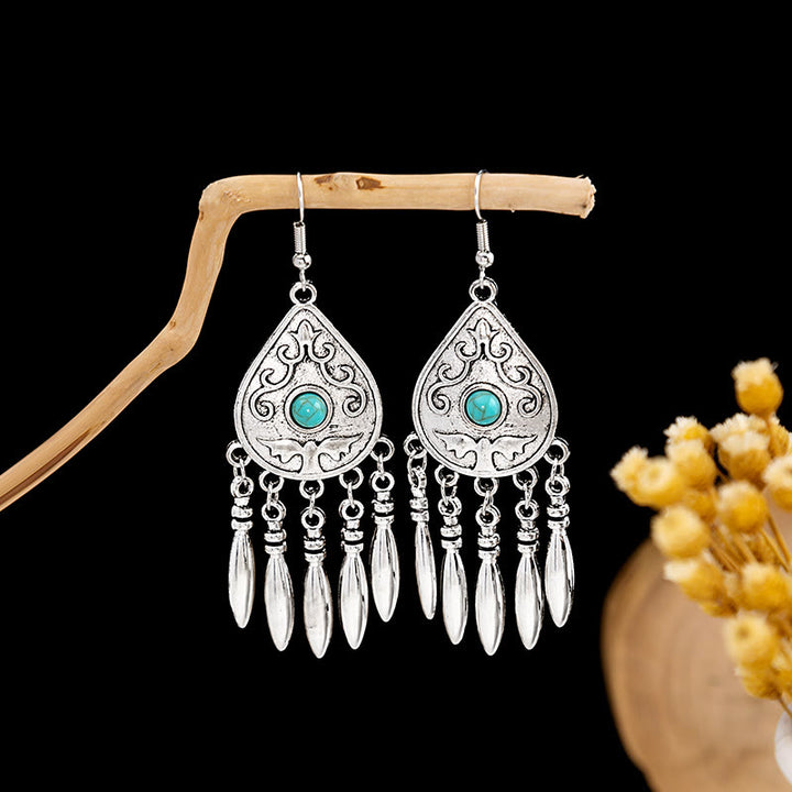Boucles d'oreilles Olivenorma style ethnique rétro bohème à pampilles turquoise