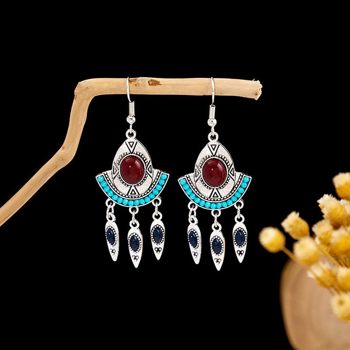 Boucles d'oreilles Olivenorma style ethnique rétro bohème à pampilles turquoise
