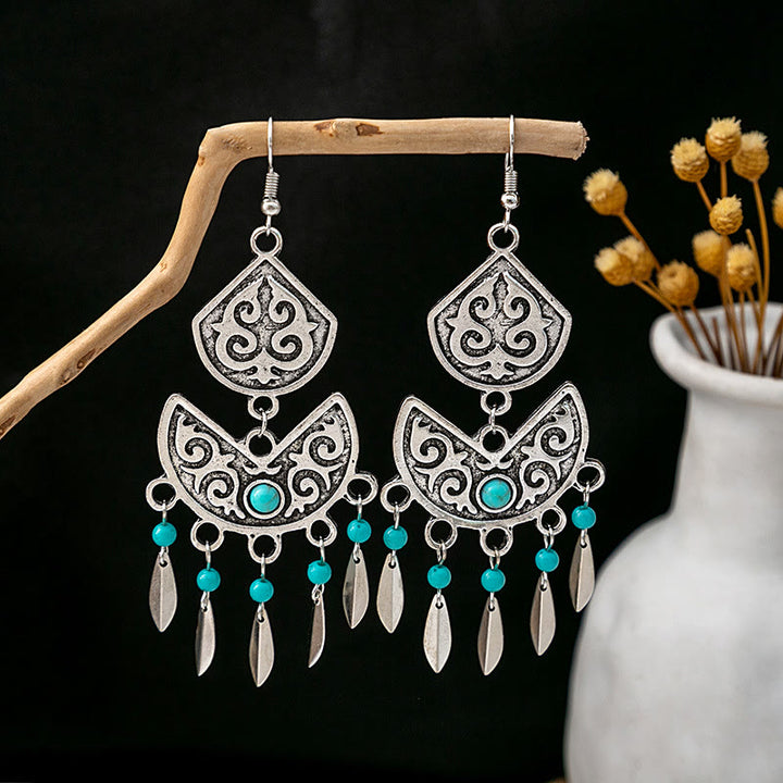 Boucles d'oreilles Olivenorma style ethnique rétro bohème à pampilles turquoise