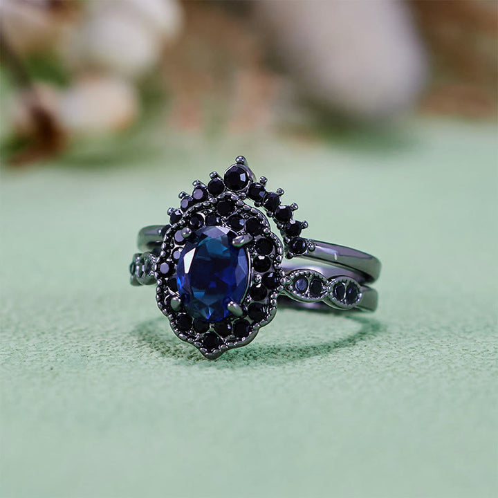 Parure de mariée florale Olivenorma en or noir et saphir ovale