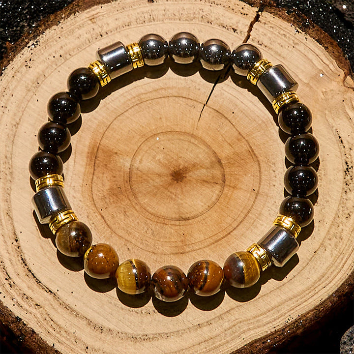 Bracelet Olivenorma en perles d'hématite et d'obsidienne œil de tigre bleu