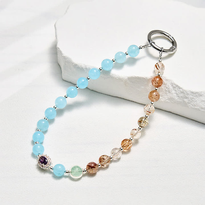 Porte-clés Olivenorma en quartz rutile aigue-marine et or, dragonne en cristal pour téléphone - Quartz rutile aigue-marine et or - image 0