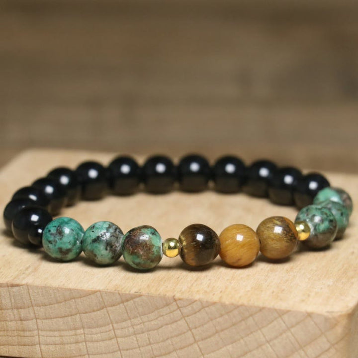 Bracelet de perles de guérison en œil de tigre naturel et turquoise africaine Olivenorma - image 2