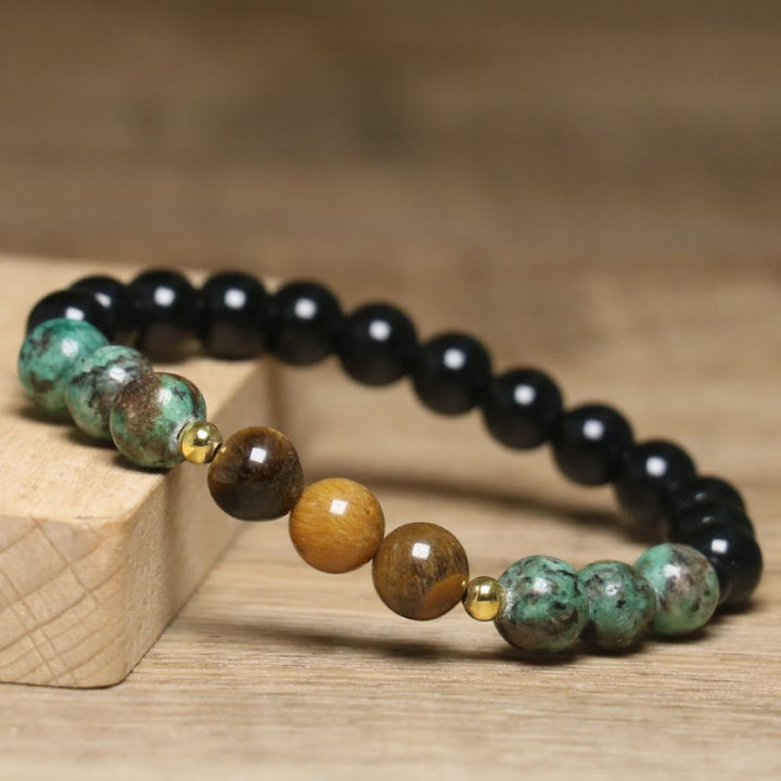 Bracelet de perles de guérison en œil de tigre naturel et turquoise africaine Olivenorma - image 3