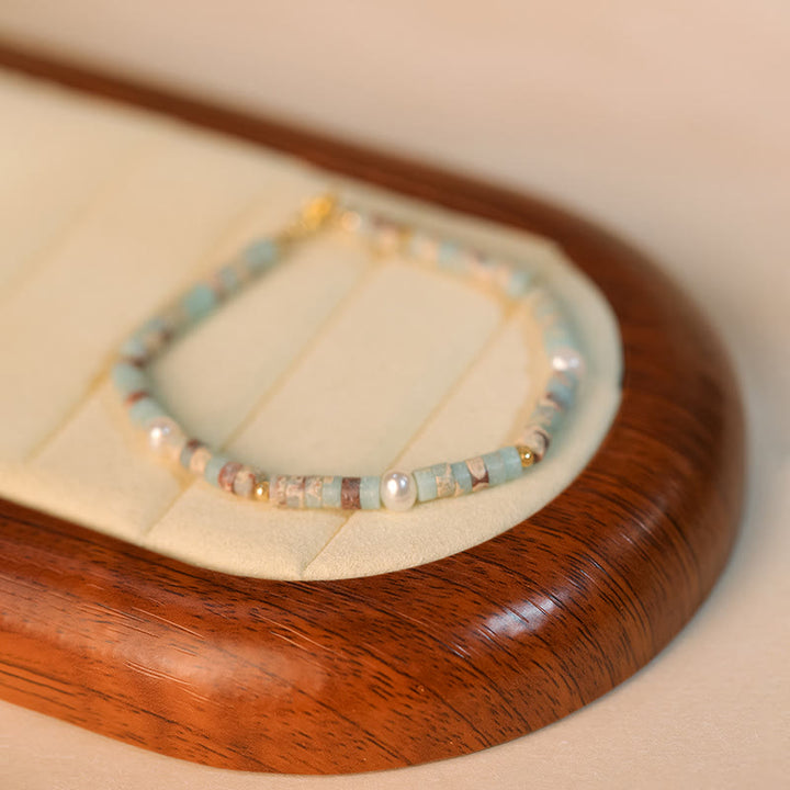 Bracelet de perles Olivenorma en rhodochrosite naturelle pour attirer l'amour - Agalmatolite - image 9