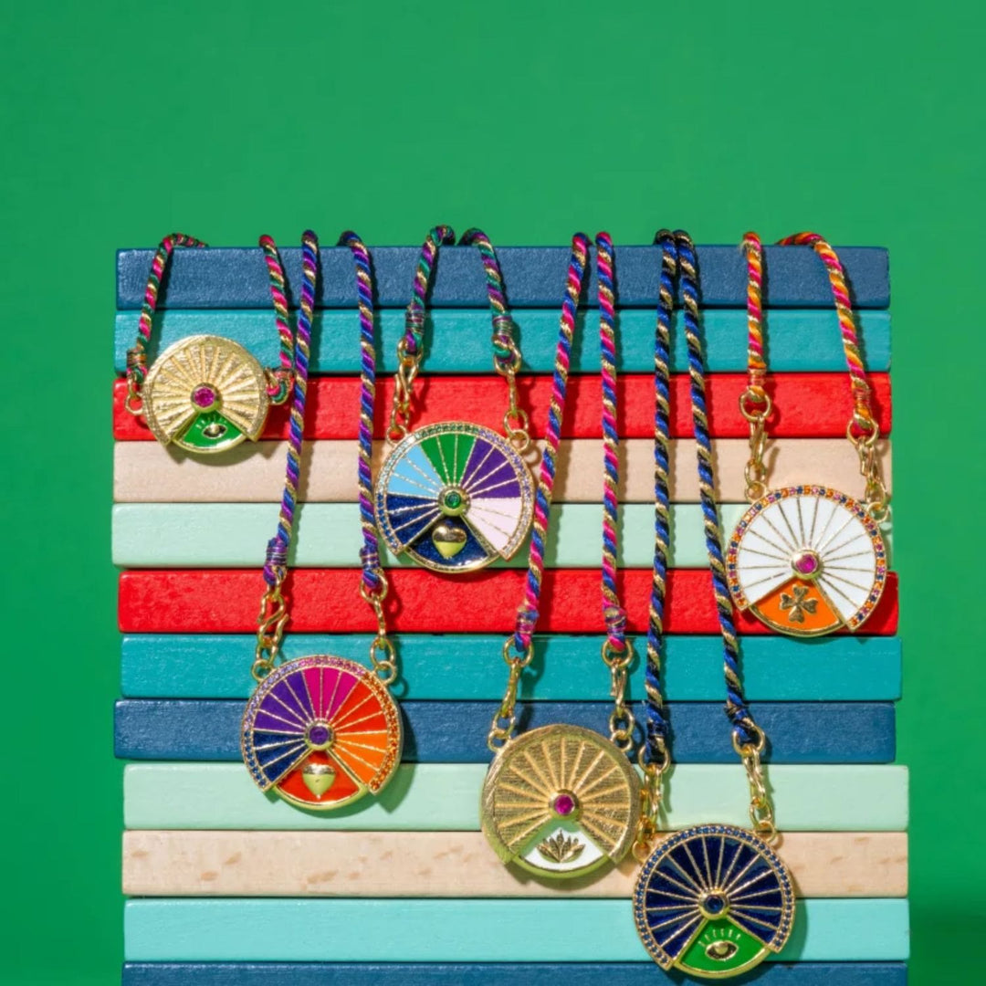 Collier porte-bonheur rotatif Olivenorma avec pendentif tribal en corde tressée - image 0