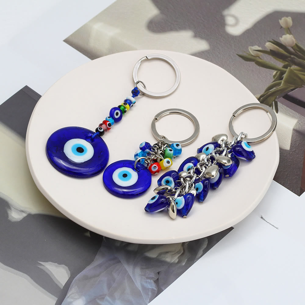 Porte-clés Olivenorma en forme de cœur bleu vibrant avec plusieurs breloques - image 0
