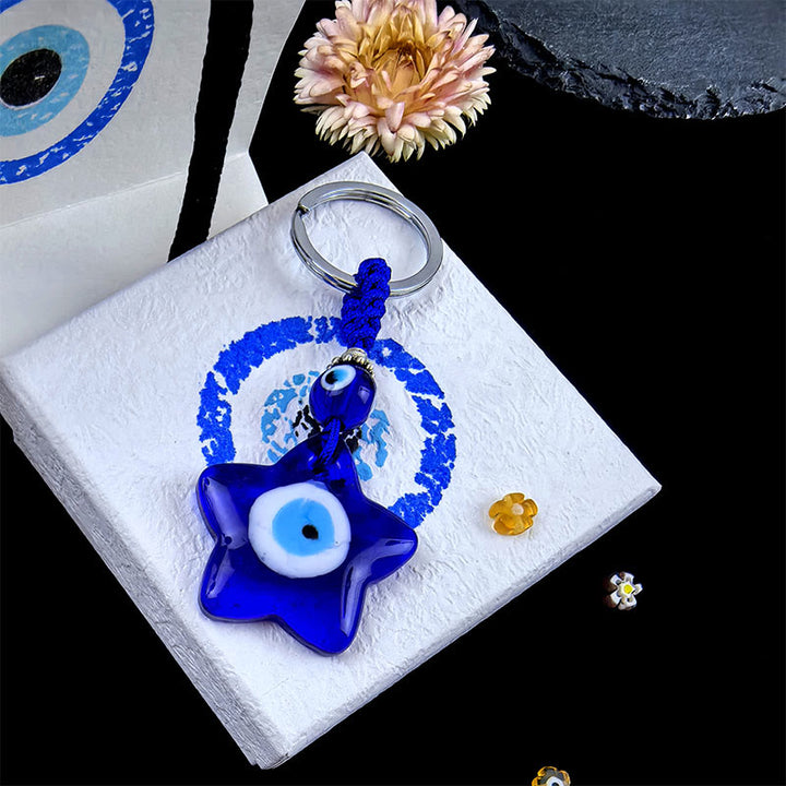 Porte-clés protecteur Olivenorma bicolore contre le mauvais œil - Formes assorties - Étoile - image 16