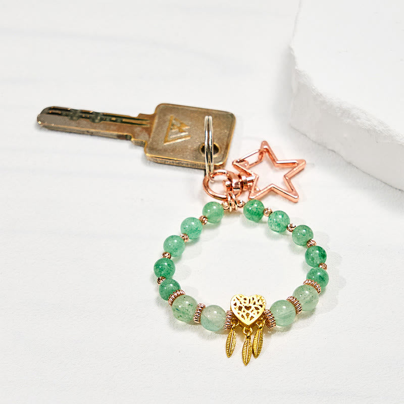 Porte-clés en quartz rutile vert Olivenorma , dragonne pour téléphone en cristal - image 1