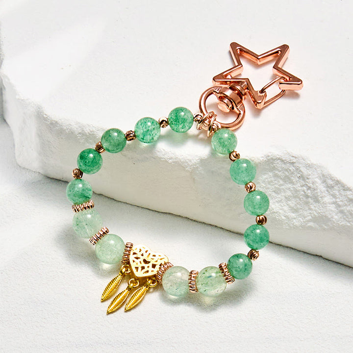 Porte-clés en quartz rutile vert Olivenorma , dragonne pour téléphone en cristal - Quartz rutile vert - image 0