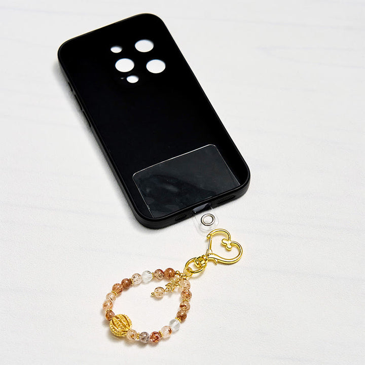 Porte-clés Olivenorma en quartz rutile doré et dragonne pour téléphone en cristal - image 2