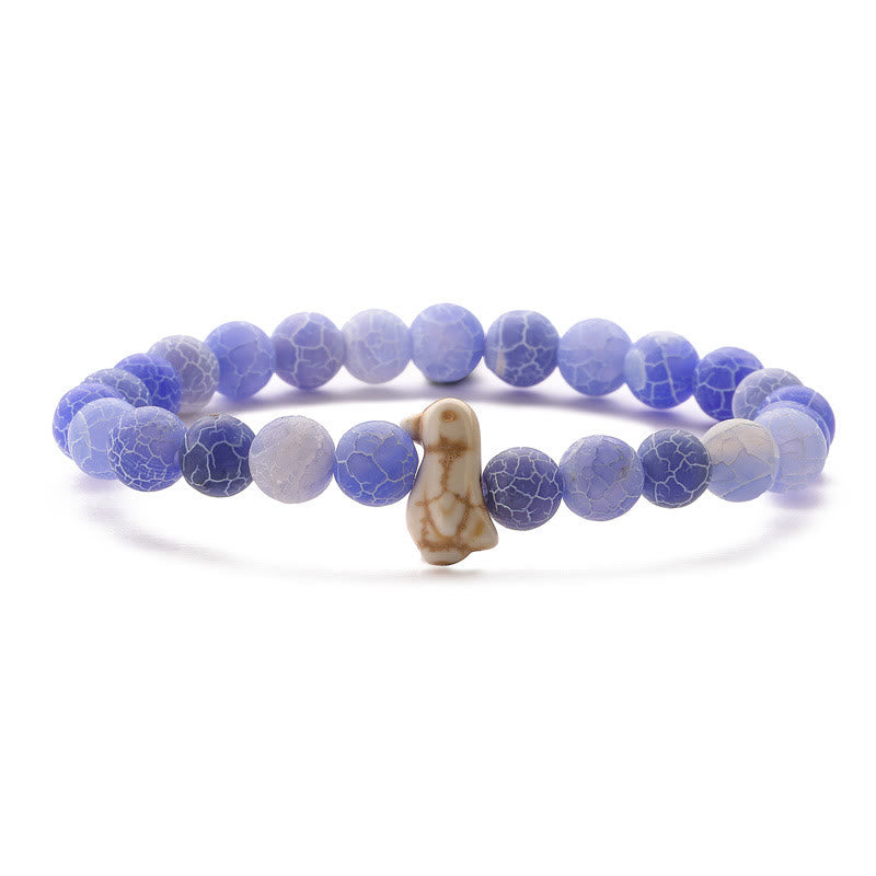 Bracelet Olivenorma pour la protection de l'habitat des manchots avec carte - Agate craquelée bleu clair - Avec carte - image 5