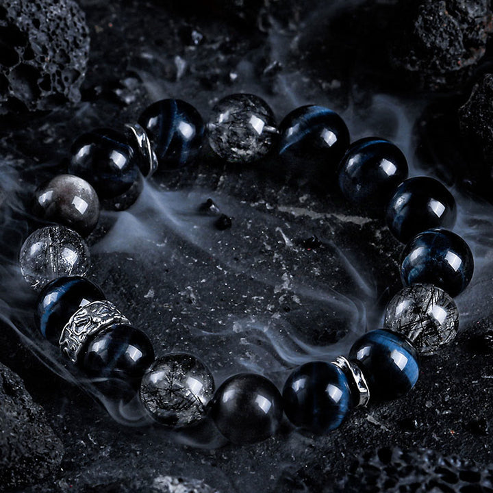Bracelet Olivenorma en œil de tigre bleu et obsidienne argentée - image 1