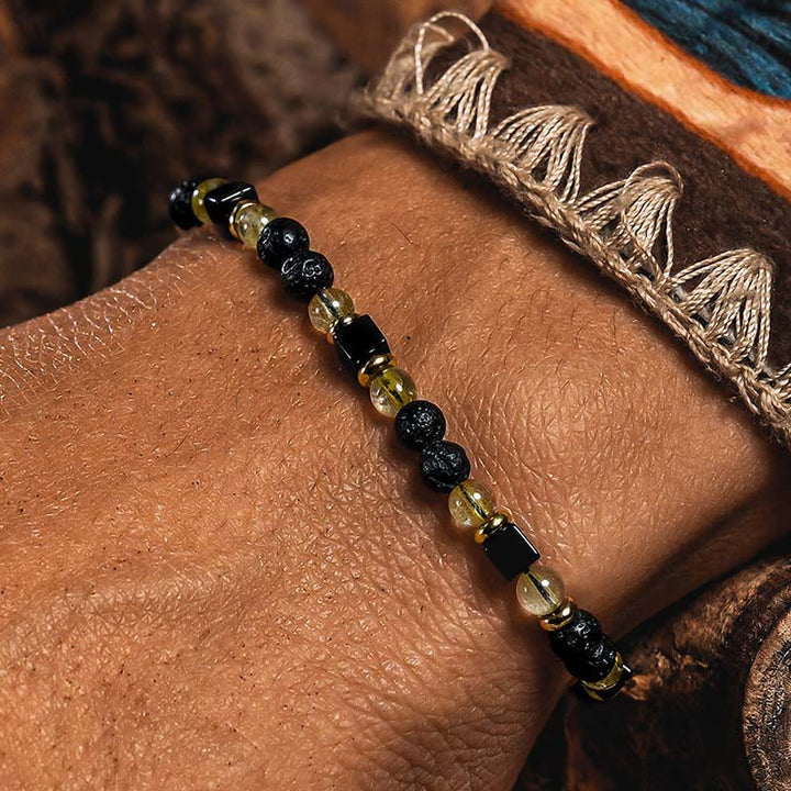 Bracelet Olivenorma en perles de quartz rutile doré et de pierre de lave - image 4