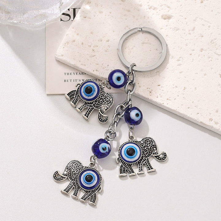 Porte-clés protecteur Olivenorma Classic Evil Eye Multi Charm - Œil maléfique de l'éléphant - image 0