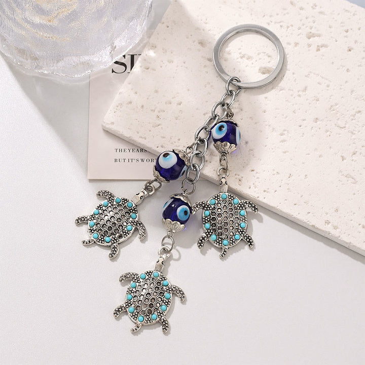 Porte-clés protecteur Olivenorma Classic Evil Eye Multi Charm - Tortue Bleu Ciel - image 7
