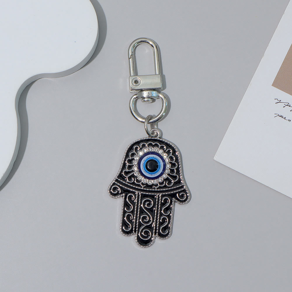 Ornement pendentif clé Hamsa œil maléfique incrusté de strass Olivenorma - Noir et argent - image 12