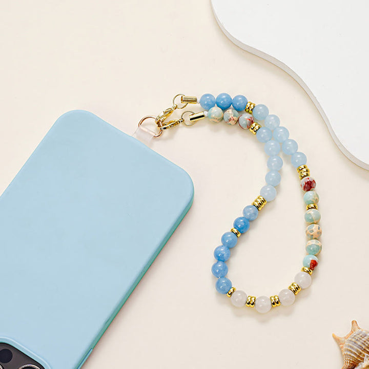Chaîne de téléphone amovible Olivenorma, délicate et polie, ornée de perles. - Apatite bleue, aigue-marine et agalmatolite - image 0