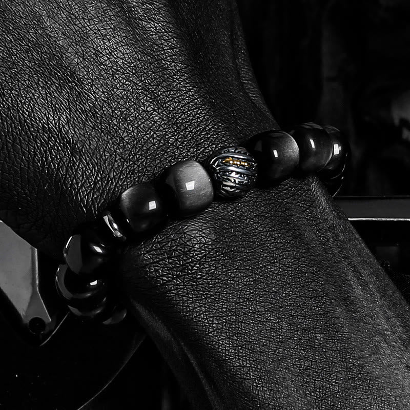 Bracelet à breloques Olivenorma en obsidienne argentée avec symbole torsadé gravé - image 4