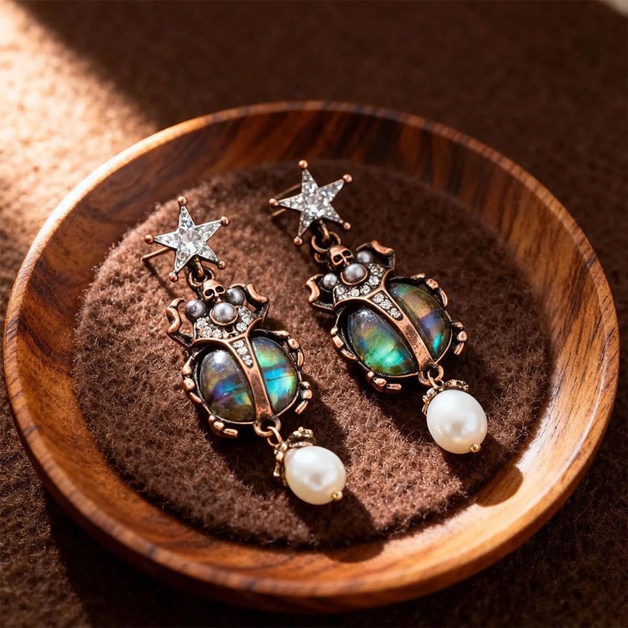 Boucles d'oreilles pendantes Olivenorma Vintage Star & Beetle Pearl. - Goujon - image 0