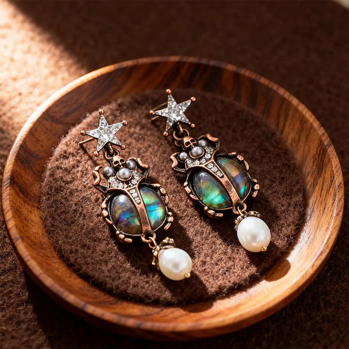 Boucles d'oreilles pendantes Olivenorma Vintage Star & Beetle Pearl. - Goujon - image 0