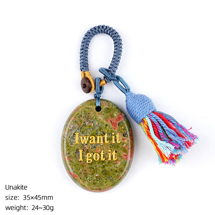 Olivenorma « Je le veux, je l'ai » Pierre à soucis en pierre naturelle gravée avec pompon - Unakite - image 20