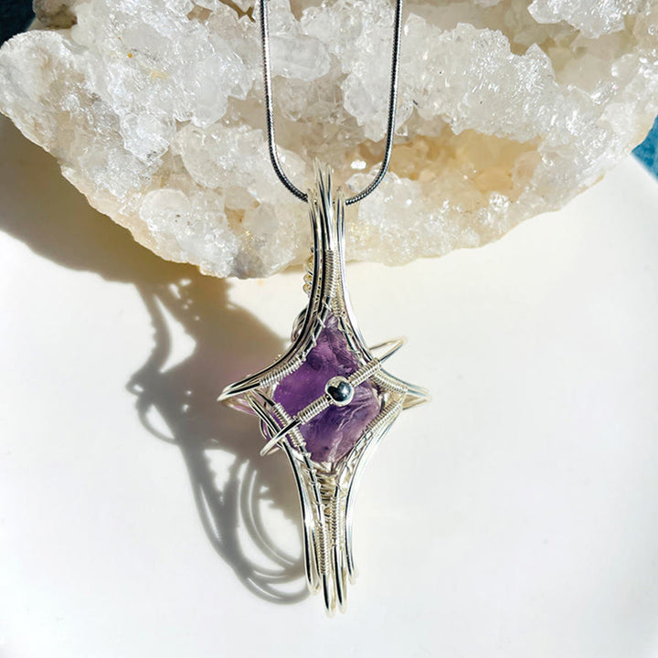 Collier Olivenorma à thème céleste en améthyste et aigue-marine, pierres naturelles enroulées de fil. - Améthyste et Planète - image 1