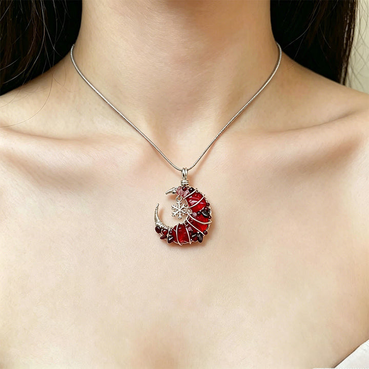 Collier Olivenorma fait main en fil de fer, orné de grenat et de verre rouge, en forme de croissant de lune. - image 1