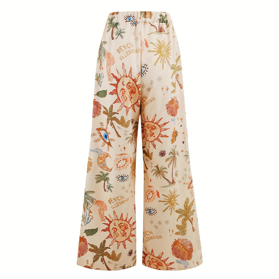 Pantalon Olivenorma Boho Sun à imprimé palmier et œil maléfique, jambes larges et cordon de serrage - image 1