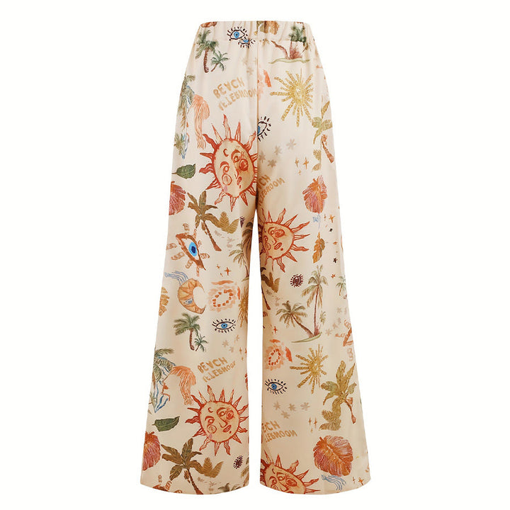 Pantalon Olivenorma Boho Sun à imprimé palmier et œil maléfique, jambes larges et cordon de serrage - image 1