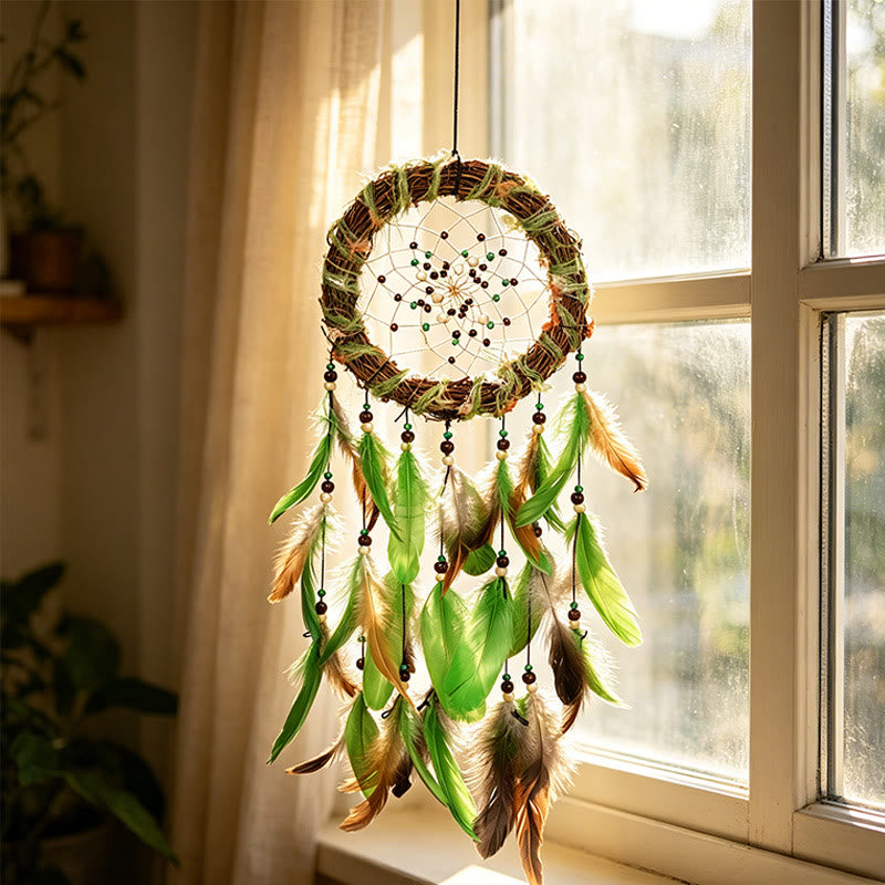 Attrape-rêves Olivenorma en plumes, perles, cordon, bois et brindilles, tissé à la main, symbole de la nature - image 1